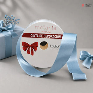 Spool of blue ribbon with a decorative bow on a gray background, featuring the brand 'melania'.