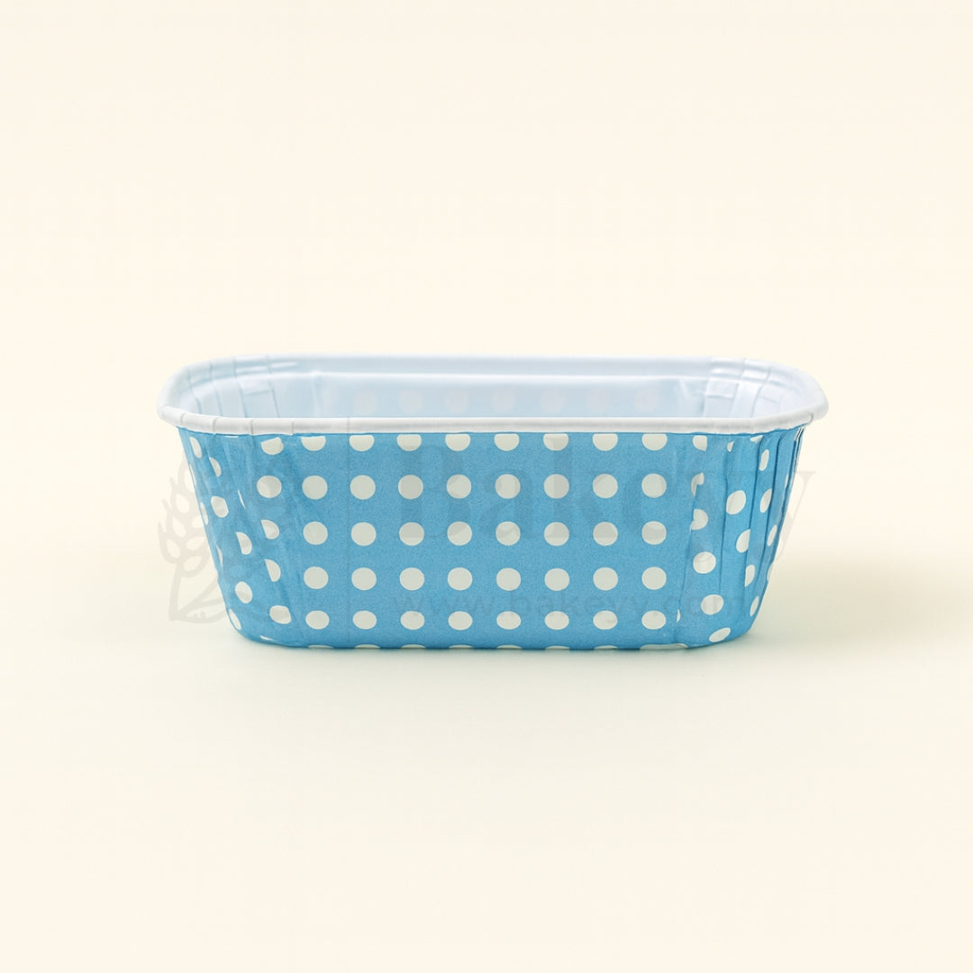 Rectangular blue container with white polka dots on a white background