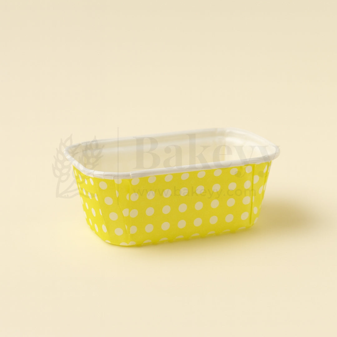 Yellow polka dot container on a beige background