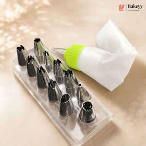 A set of 12 stainless steel piping nozzles in a clear plastic tray, a white piping bag with a bright green cap, and a folded white pastry bag, displayed on a beige marble surface with a soft shadow overlay. The Bakeey brand logo is visible in the top right corner.