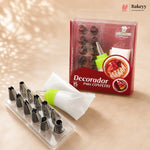 A 15-piece piping decoration set for confectionery, including metal piping tips in a clear plastic tray, a white piping bag with a green connector, and the retail packaging box. The box is red and white with pictures of decorated pastries.