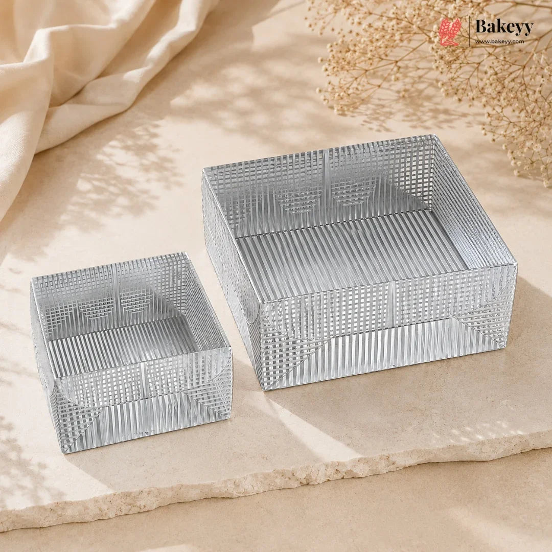 Two metallic wire baskets on a beige fabric background with 'Bakey' branding.