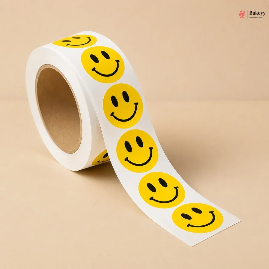 Roll of yellow smiley face stickers on a beige background