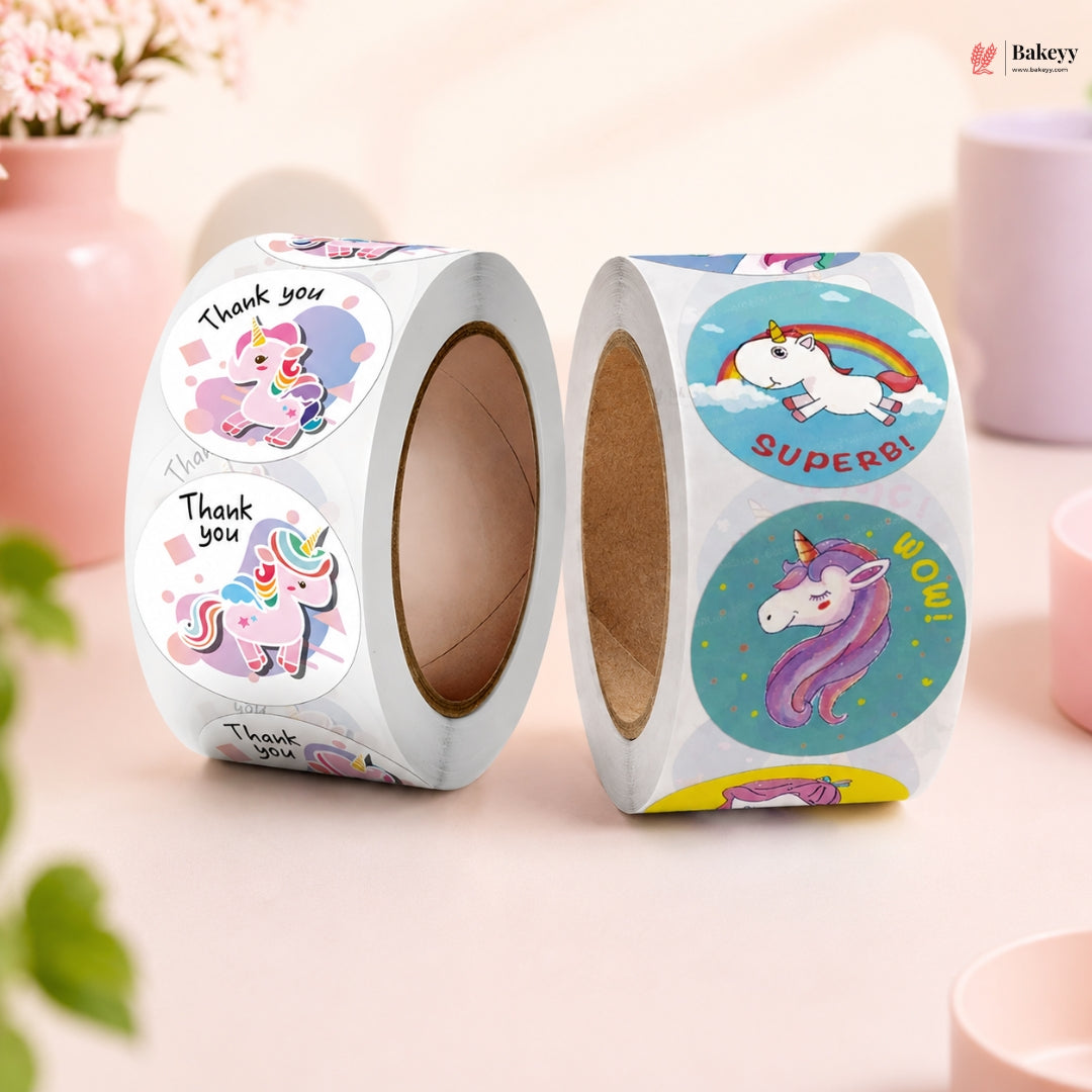 Two rolls of unicorn-themed stickers with decorative designs on a light background.