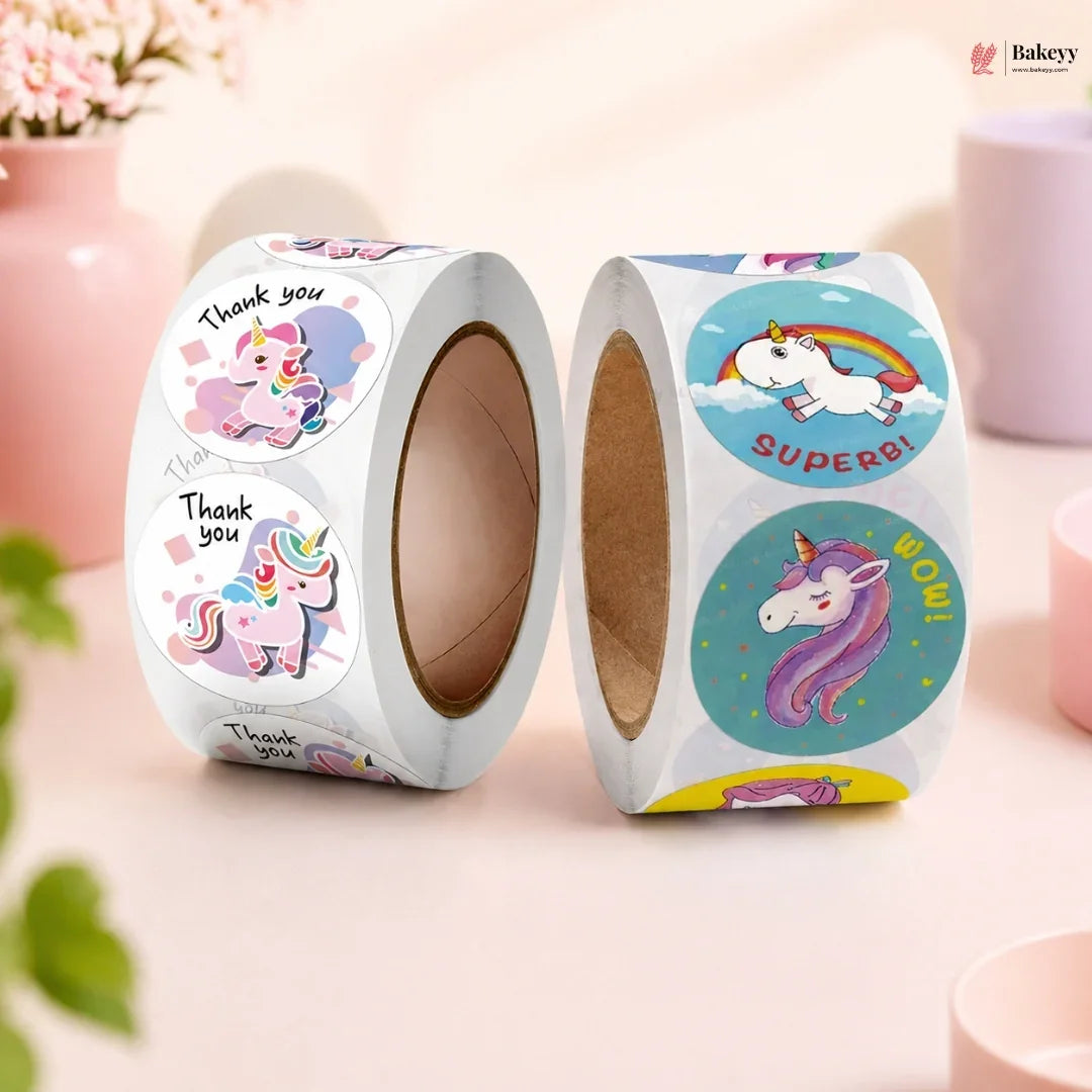 Two rolls of unicorn-themed stickers with decorative designs on a light background.