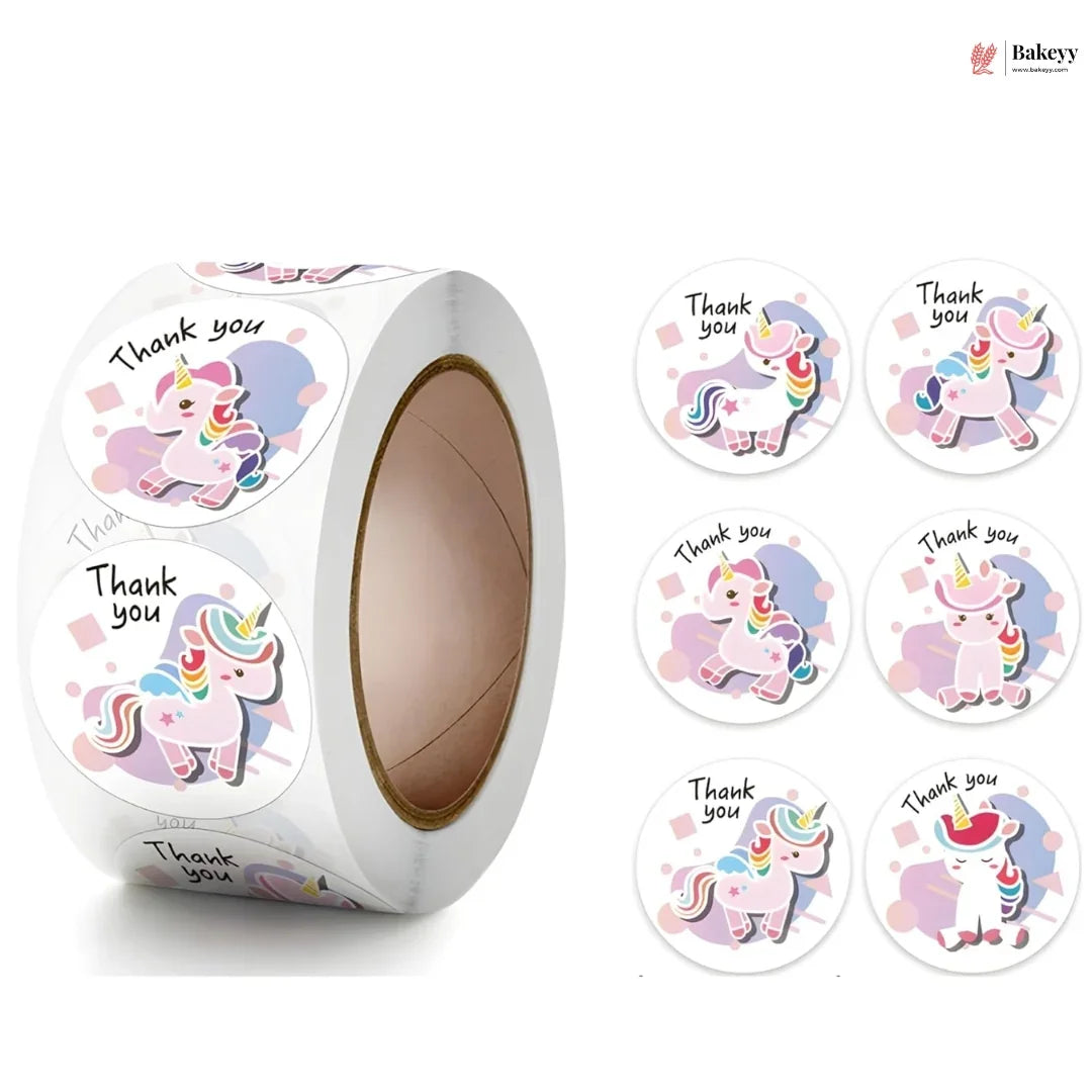 Roll of unicorn-themed 'Thank you' stickers with a visible brand logo.