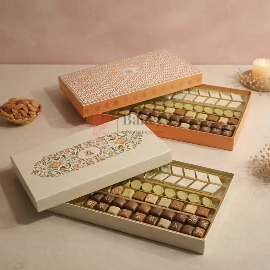 Capacity: Suitable for approx. 1 kg sweets or chocolates (depending on product type)
Premium rigid hardboard construction
Luxury floral printed lid design
Gold finish food-grade plastic inner tray
4 long compartments for organized arrangement
Ideal for Diwali, Weddings, Festive Hampers & Corporate Gifting