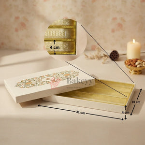 Capacity: Suitable for approx. 1 kg sweets or chocolates (depending on product type)
Premium rigid hardboard construction
Luxury floral printed lid design
Gold finish food-grade plastic inner tray
4 long compartments for organized arrangement
Ideal for Diwali, Weddings, Festive Hampers & Corporate Gifting
