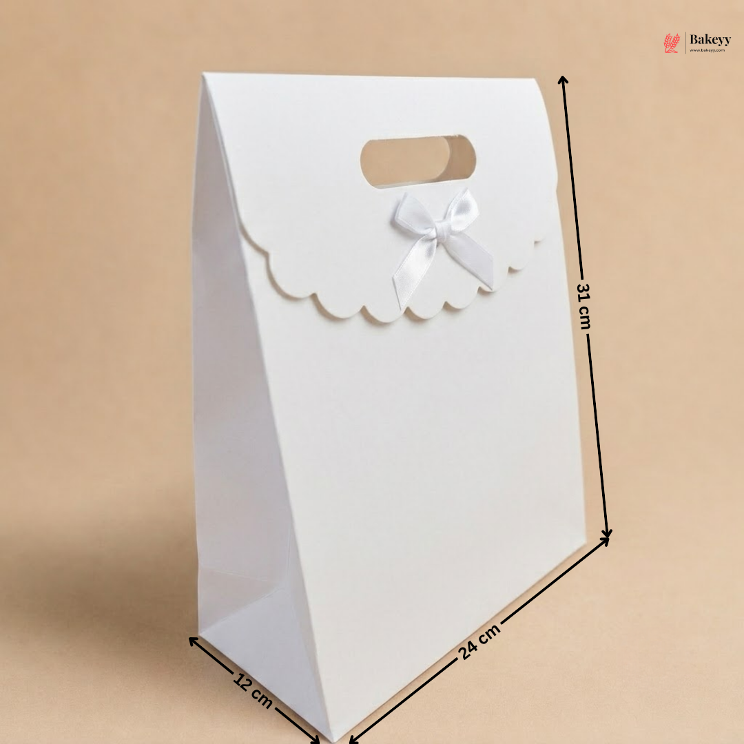 White gift bag with a bow and measurements on a beige background