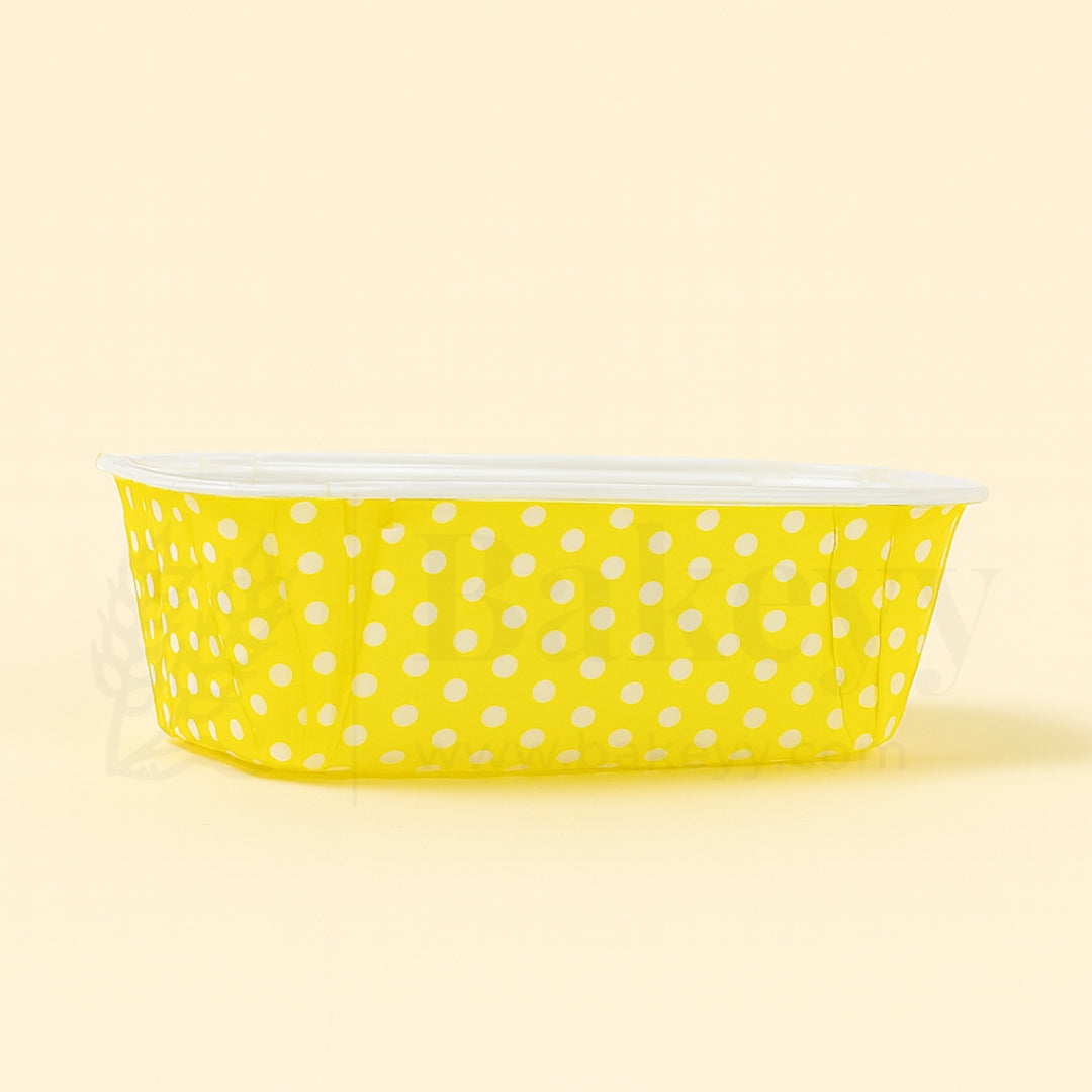 Yellow container with white polka dots on a beige background