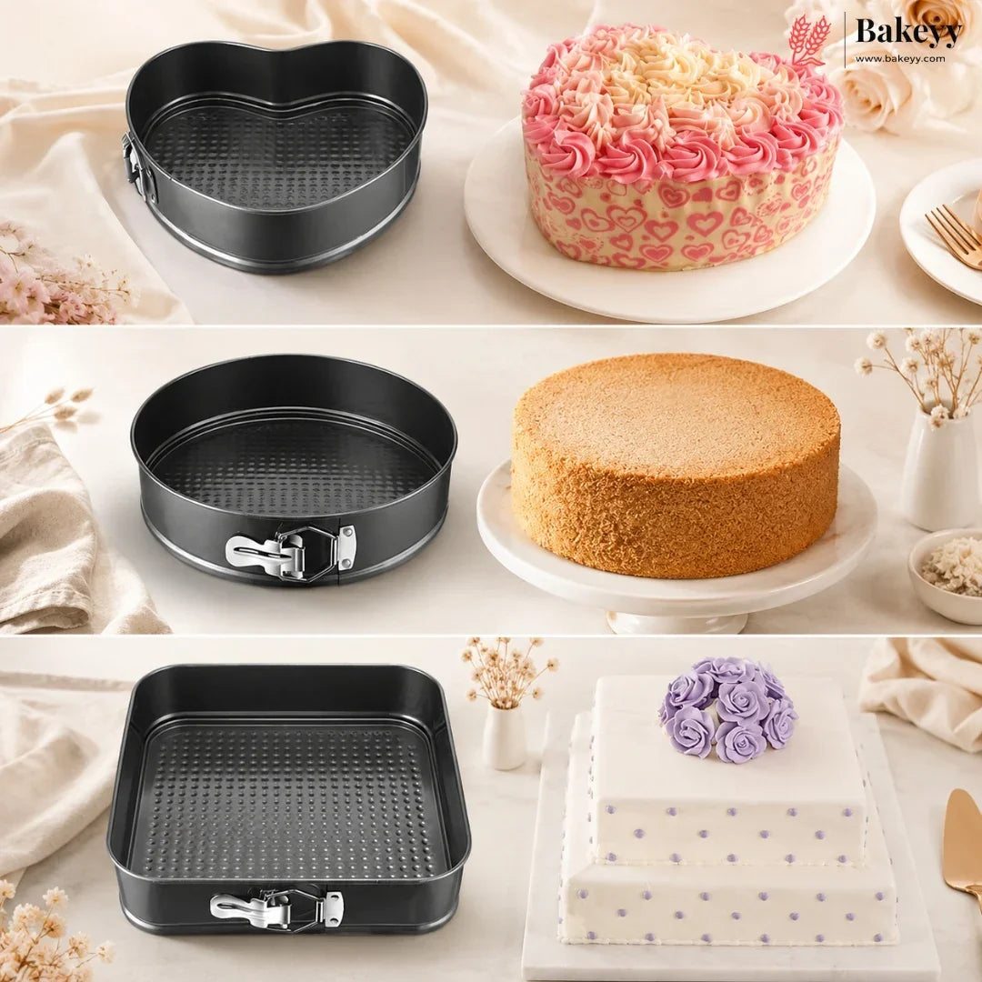 Four baking pans shown in a collage with decorated cakes: a heart-shaped pan, a round springform pan, a square springform pan, and a rectangular non-stick pan. The background is a warm cream tabletop with fabric and small decorative props.