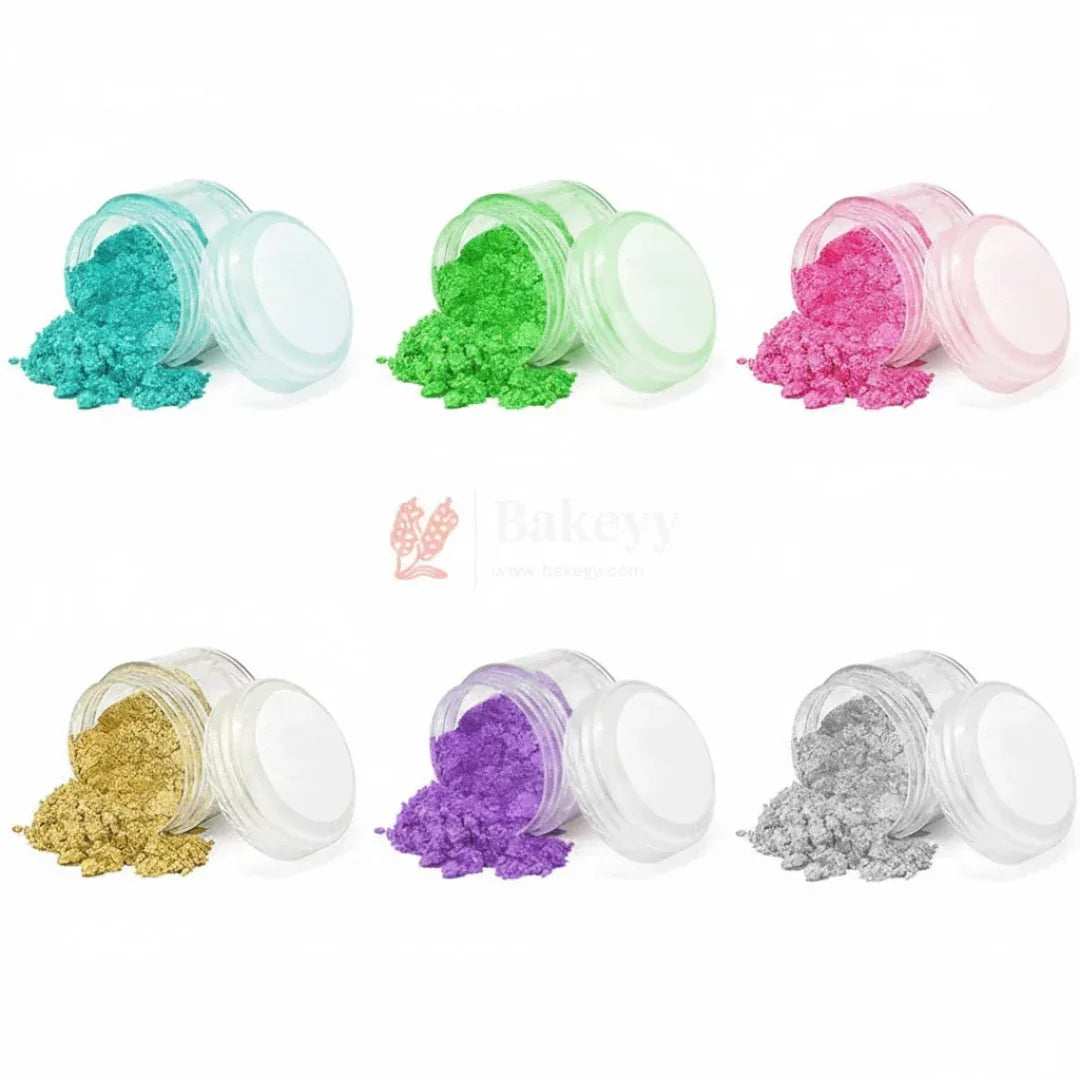 Six jars of colorful edible cake dust powders for baking, available at Bakeyy India.