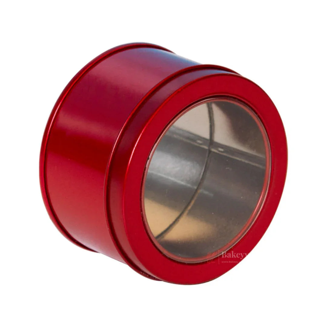 Red round tin container with clear lid for bakery packaging from Bakeyy.com
