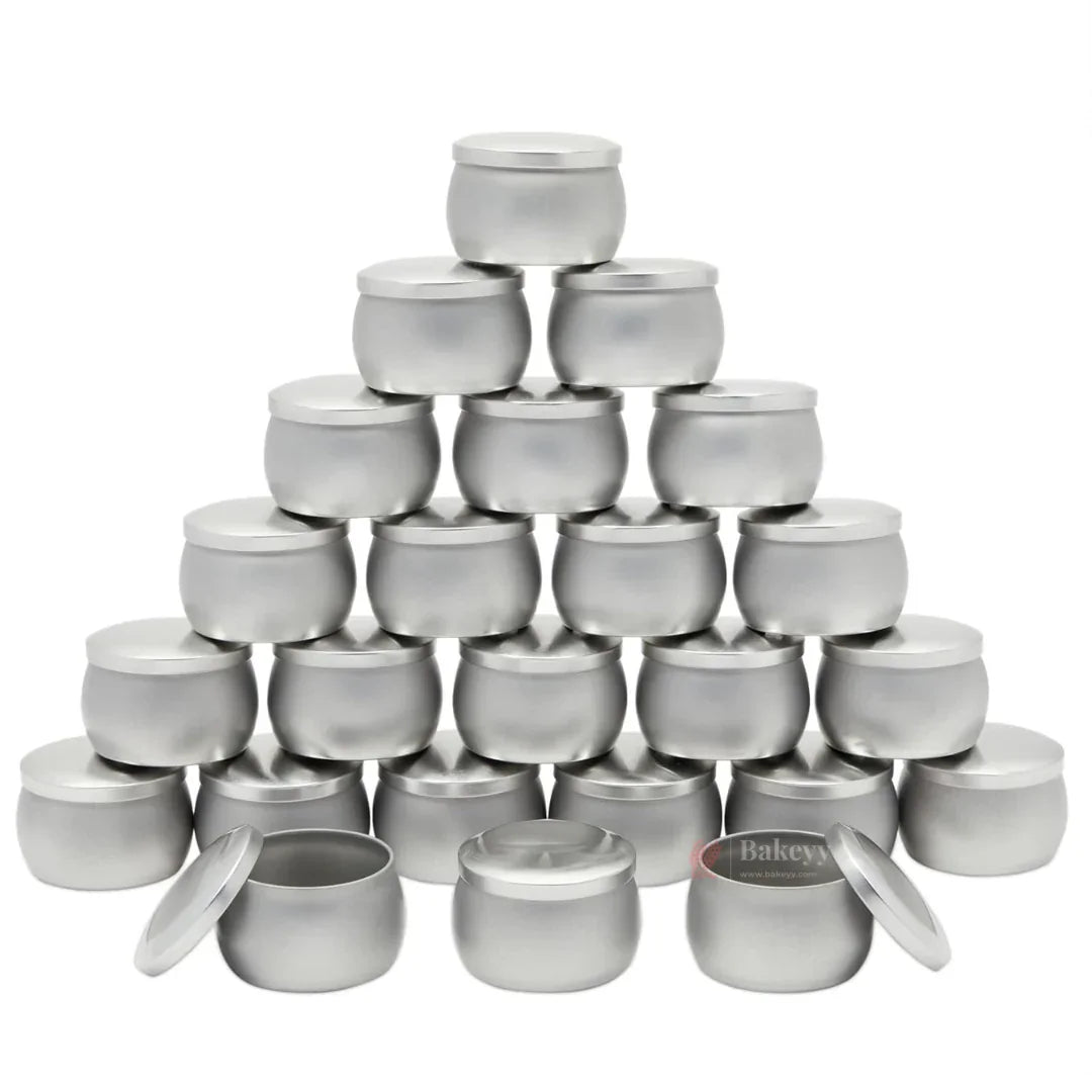 Stack of small silver aluminum jars with lids, perfect for baking supplies at Bakeyy.com