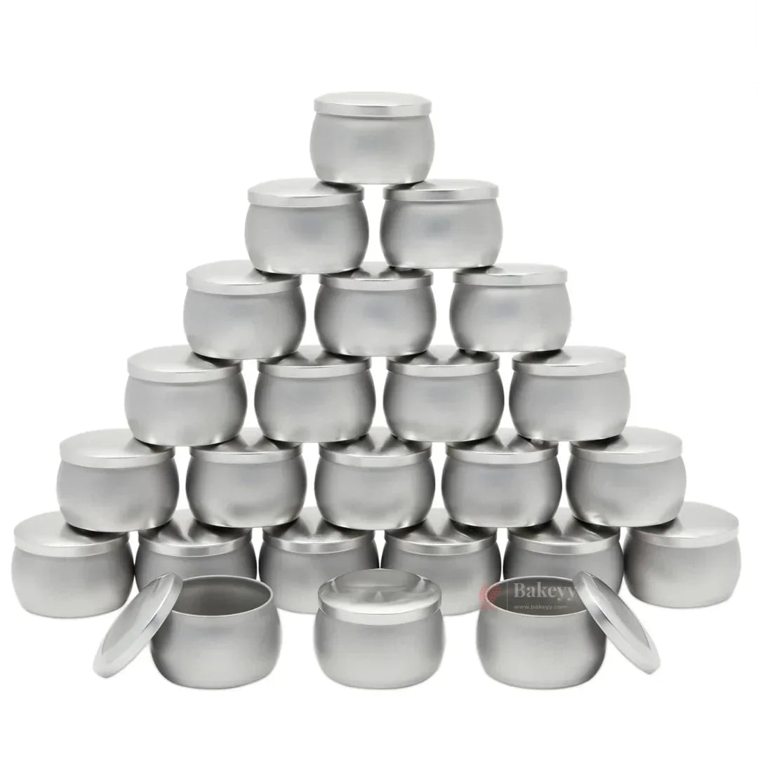 Stack of small silver aluminum jars with lids, perfect for baking supplies at Bakeyy.com