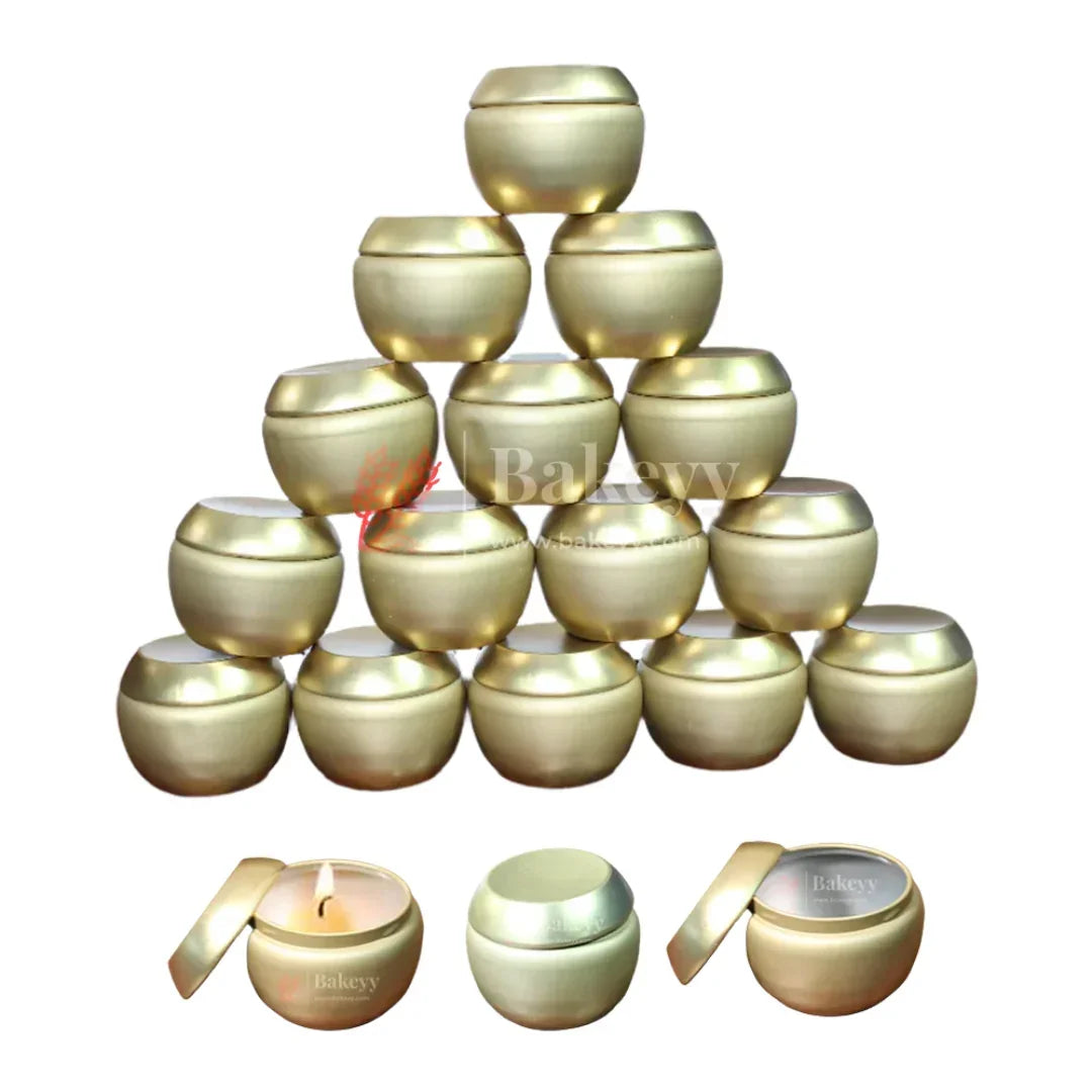 Stack of gold metal round candle tins with lids from Bakeyy wholesale, gift packaging supplies.
