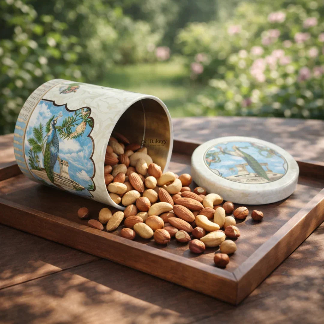 Assorted nuts spilling from a decorative tin on a wooden tray, Bakeyy baking supply product