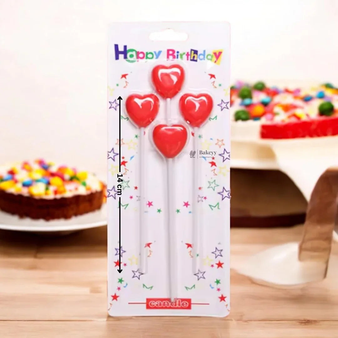 Bakeyy heart-shaped red birthday candles pack, 14cm, with cakes in background, bakery supplies