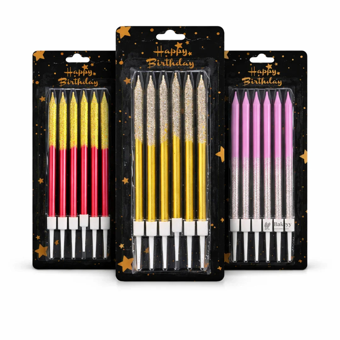 Bakeyy birthday cake candles in red, gold, and pink packs with glitter, ideal for cake decorating.