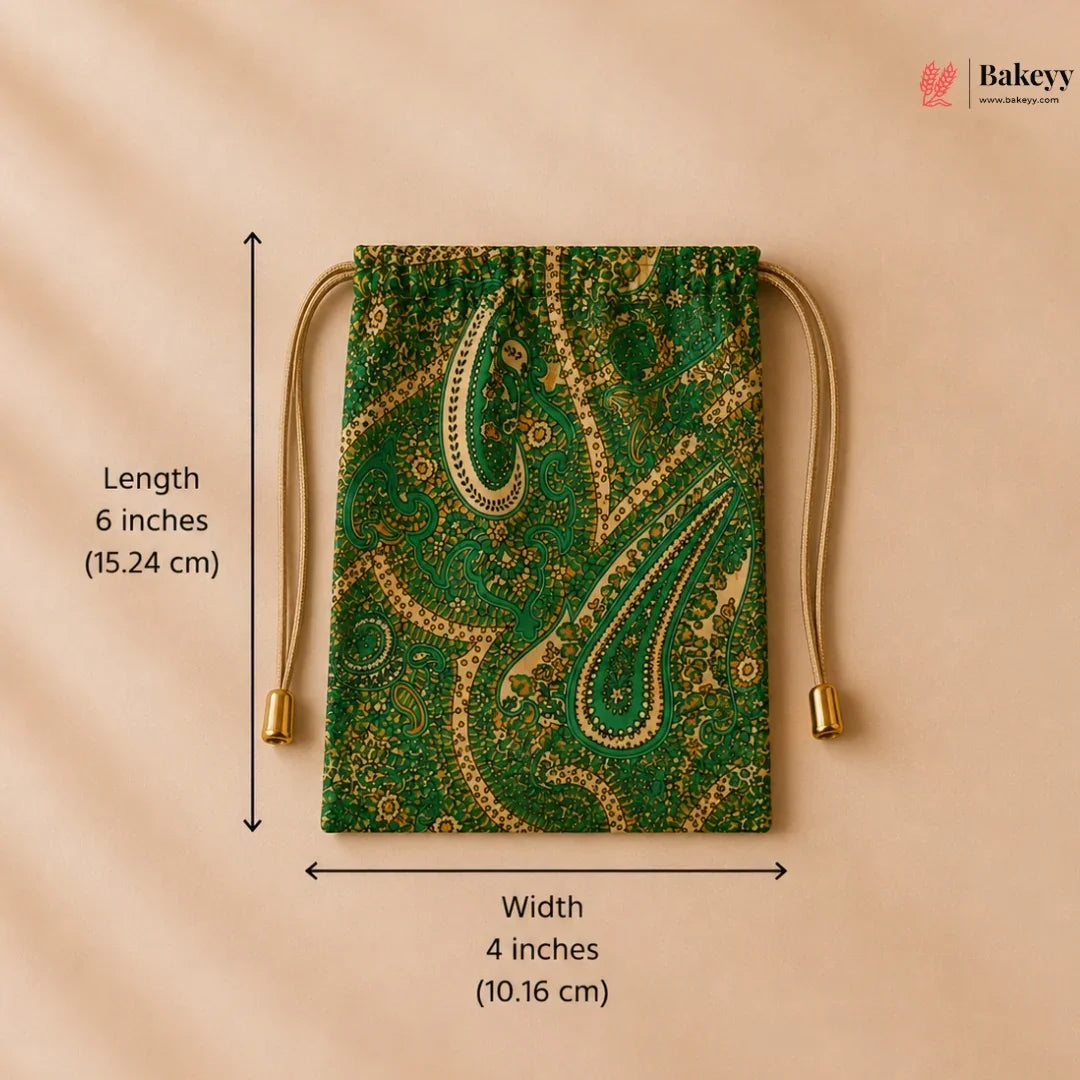 Green drawstring bag with gold paisley pattern and measurements on a beige background
