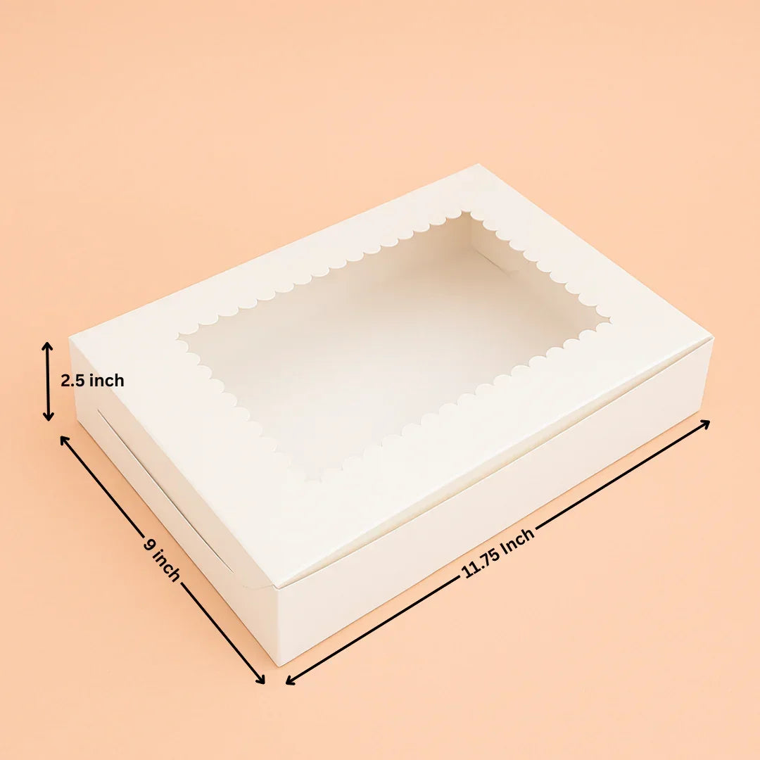 White bakery box with clear window and scalloped edge, 11.75 x 9 x 2.5 inches, on peach background