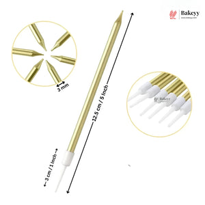 A single gold metal cake topper with multiple pointed tips, shown on a white background with dimension labels indicating 12.5 cm length and a 3 cm tip width.