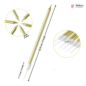 A single gold metal cake topper with multiple pointed tips, shown on a white background with dimension labels indicating 12.5 cm length and a 3 cm tip width.