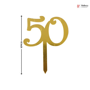 Gold metallic number 50 cake topper with a stake, shown with a height measurement of 4 inches on a white background.