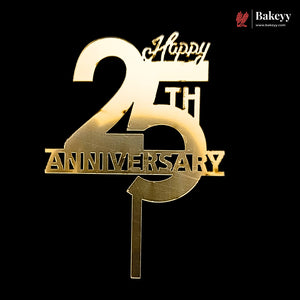 A gold metallic 25th Anniversary cake topper with 'Happy 25th Anniversary' text on a black background, featuring a Bakeyy logo in the top right corner.