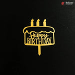 A gold metal cake topper with 'Happy Birthday' written on it, displayed on a black background with a Bakeey brand logo in the top right corner.