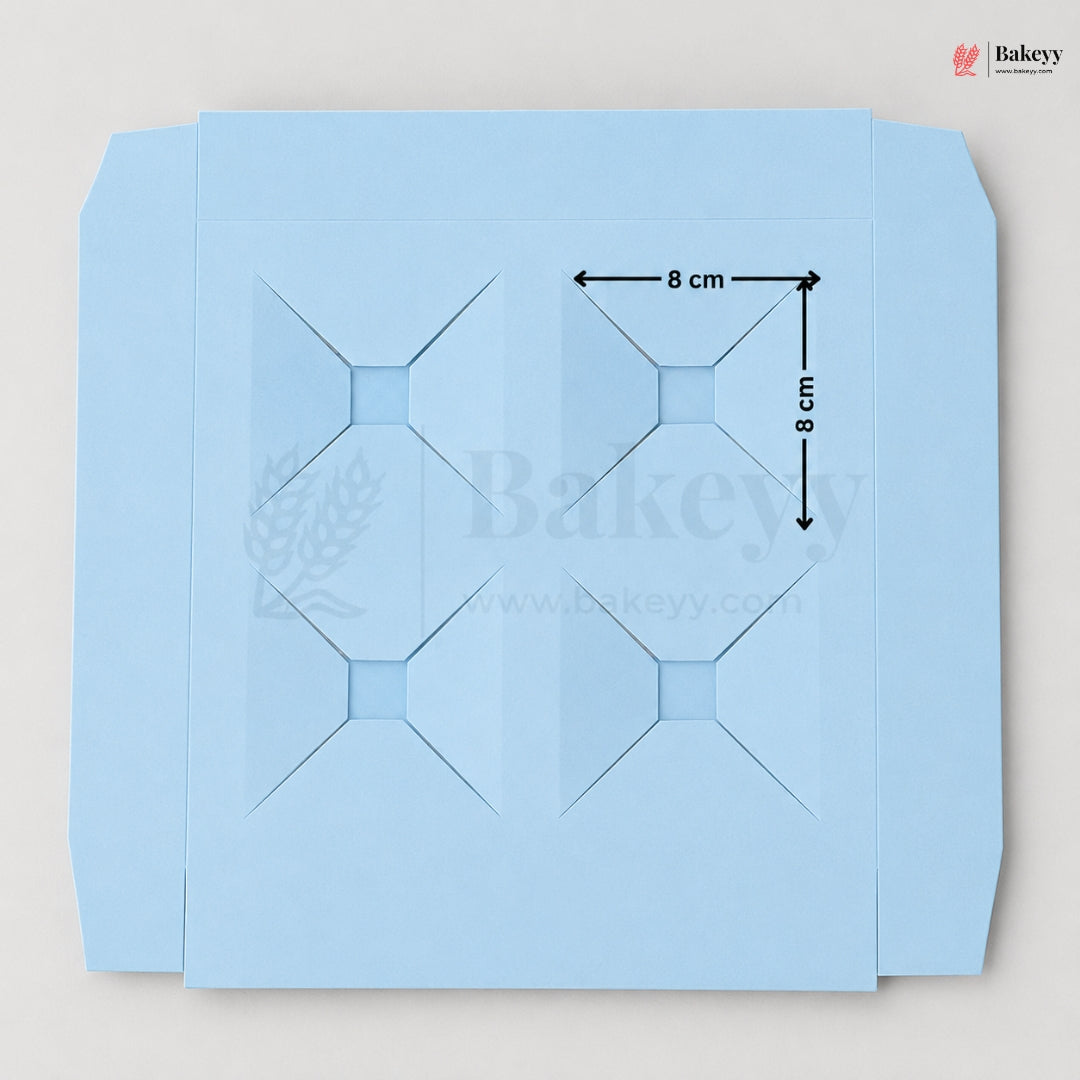 Blue baking paper with grid lines and measurements on a light gray background