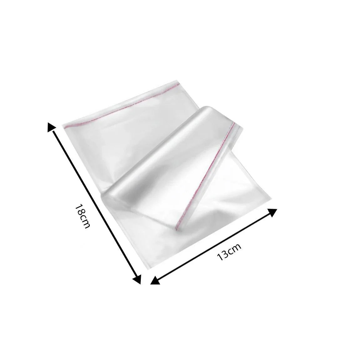 Clear 18x13cm self-adhesive plastic bags for bakery gift packaging on white background