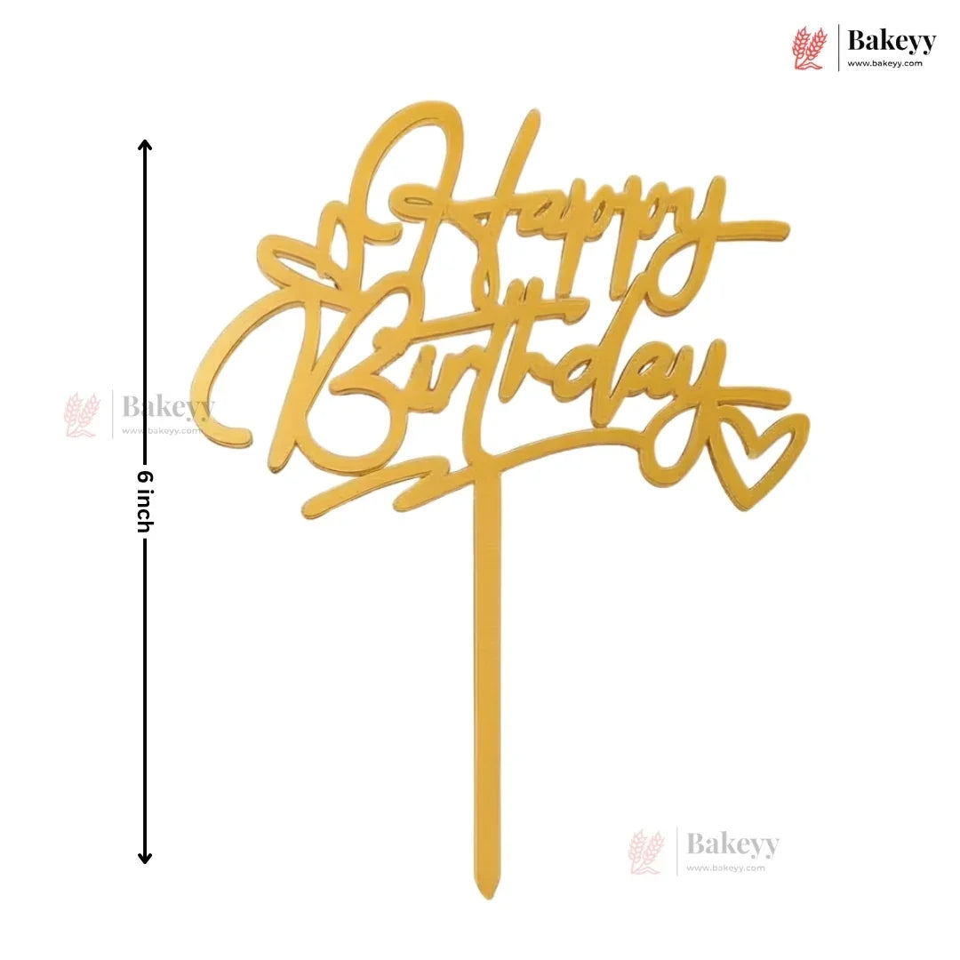 Gold 'Happy Birthday' cake topper with measurement on a white background