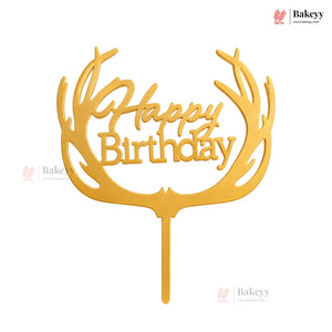 Gold 'Happy Birthday' cake topper with antler design on a white background