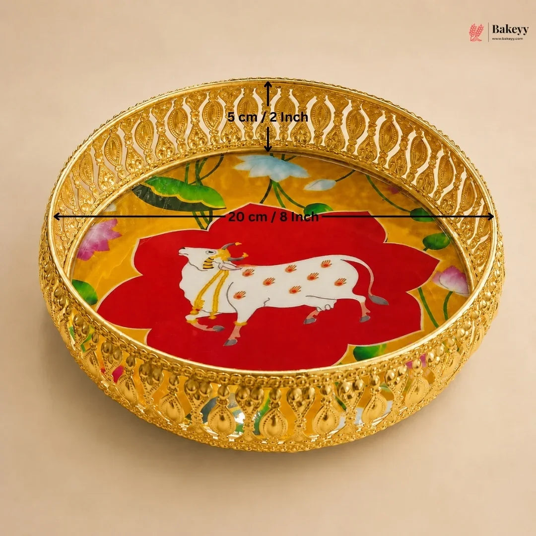 Decorative plate with a cow illustration and measurements on a beige background
