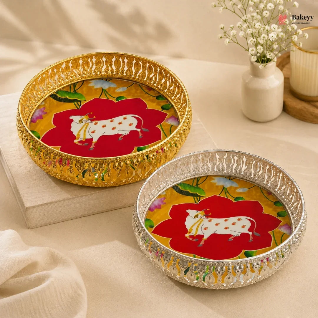 Decorative trays with cow illustration on a light background