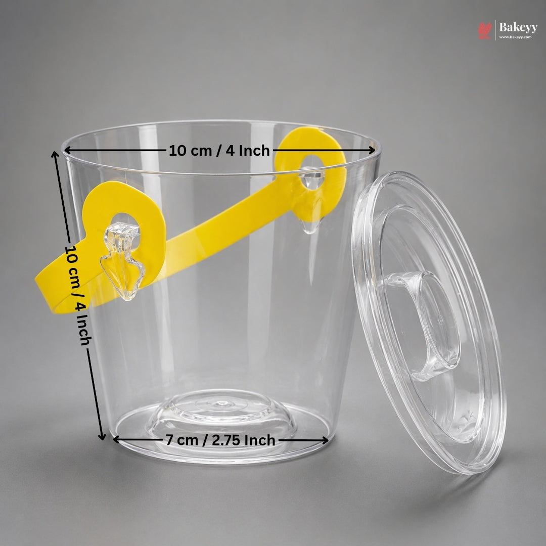 Clear plastic container with yellow measurement labels on a gray background