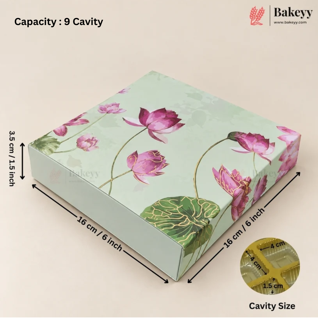 A rectangular bakery box with a light green background and pink lotus flower print, shown with dimension arrows indicating 16 cm by 16 cm by 3.5 cm, plus text reading 'Capacity : 9 Cavity' and a small cavity size inset.