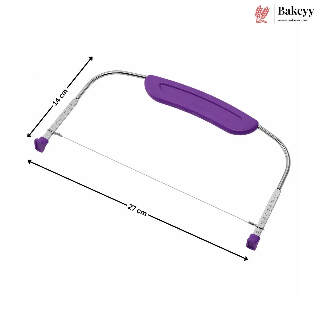 A metal cake leveler with a purple handle and purple tips, shown on a white background with black dimension arrows indicating 27 cm length and 14 cm offset. The Bakeyy logo is visible in the top right corner.