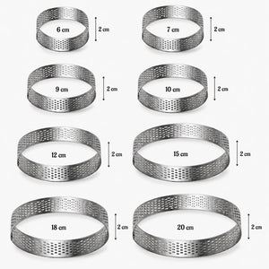 Set of metal ring molds with varying diameters on a white background