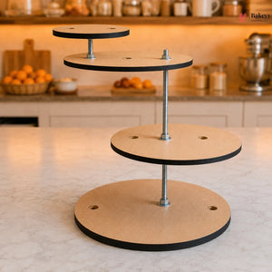 Three-tiered wooden cake stand on a kitchen counter with baking ingredients in the background.