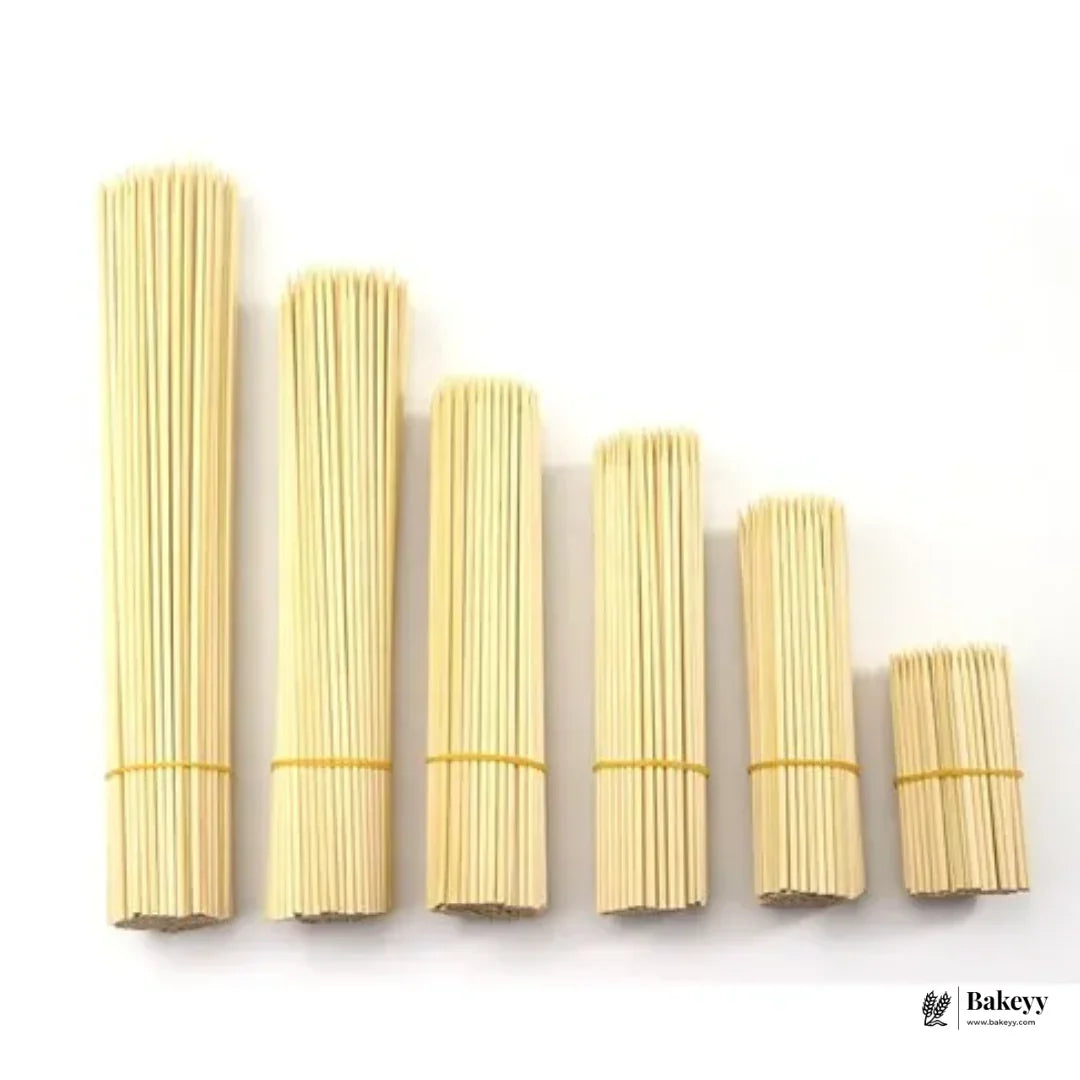 Assorted bamboo skewers bundles in various sizes on white background, Bakeyy baking supplies