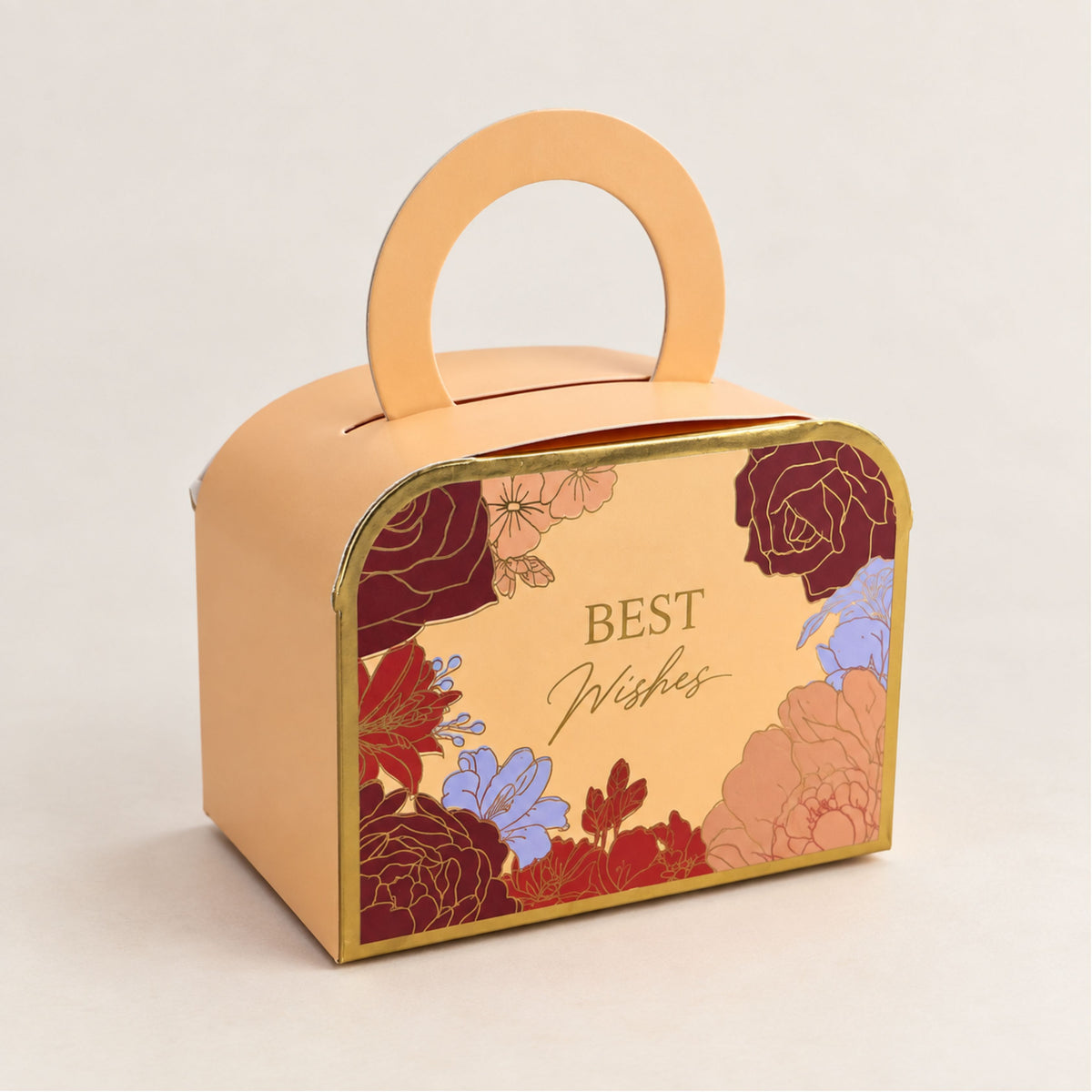 A peach-colored cardboard gift box with a built-in handle, featuring a gold border and floral illustrations in red, purple, and blue. The front of the box is printed with the words 'BEST Wishes' in gold script.