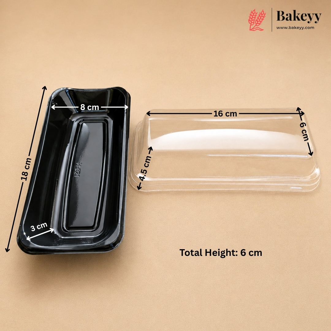 Black rectangular bakery tray with dimension arrows and measurements next to a clear plastic lid, on a beige background. The Bakeyy logo is in the top right corner.