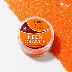 Neon orange glitter dust container with 'Blossom' branding on a white background