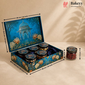 Decorated rectangular gift box containing six small jars of red dates, shown with dimension arrows and labels on a beige background. The box lid features a blue pavilion illustration with floral details, and a single jar is shown beside it with size annotations.