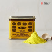 Bush Lemon Yellow Powder with a scoop of powder on a light gray background
