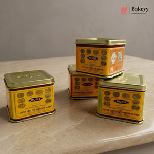 Three vintage-style metal cans with yellow labels on a marble surface, featuring the brand 'Bakeyy'.