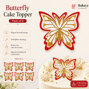 Butterfly cake topper with gold glitter detailing on a white background, featuring the Bakeyy brand.