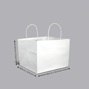 White cake bag with handles and dimensions, ideal for bakery packaging from Bakeyy.com